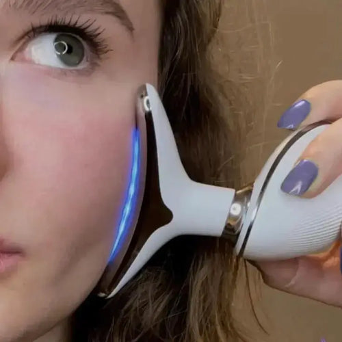 Person using a hair removal device on their face